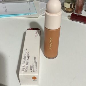 Rare Beauty Liquid Touch Foundation in Warm Tan